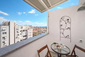 Balkón nebo terasa v ubytování Comfortable Apartment
