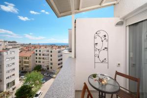 Balkón nebo terasa v ubytování Comfortable Apartment
