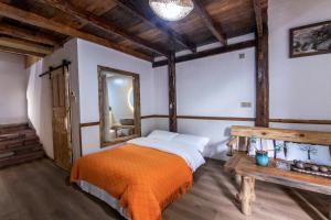 Кровать или кровати в номере Xiangzixi Bed and Breakfast