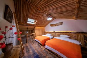 Кровать или кровати в номере Xiangzixi Bed and Breakfast