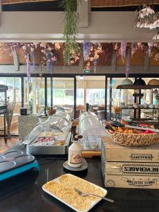 a counter with some food on a table at La Lune De Mougins - Hotel & Spa in Mougins