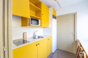 Kuchyň nebo kuchyňský kout v ubytování Residencia Universitaria Resa La Ciutadella