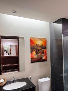 Ένα μπάνιο στο Hotel Ompu Herti