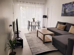 Posezení v ubytování Séjour chic proche de la mer