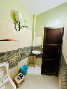 Koupelna v ubytování Hotel Vrinda Maheshwar
