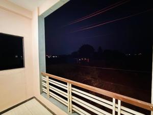 Balkón nebo terasa v ubytování Hotel Vrinda Maheshwar