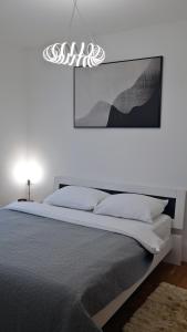 Ένα ή περισσότερα κρεβάτια σε δωμάτιο στο Apartment Sarah