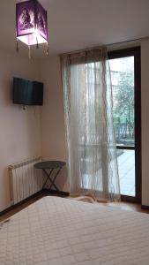 Postel nebo postele na pokoji v ubytování B&B 7 Laghi