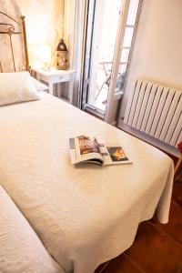 Ein Bett oder Betten in einem Zimmer der Unterkunft Hotel Puerto Arnela