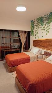 Postel nebo postele na pokoji v ubytování Casa Fly Paredón