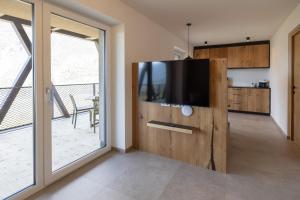 TV a/nebo společenská místnost v ubytování Gartenhof