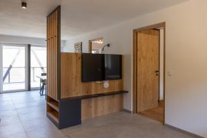TV a/nebo společenská místnost v ubytování Gartenhof