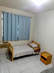 Postel nebo postele na pokoji v ubytování Mega Hotel