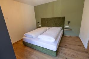 Postel nebo postele na pokoji v ubytování Gartenhof