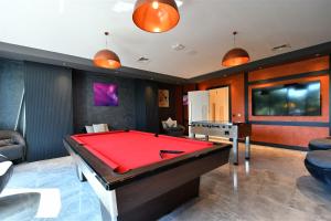 a billiard room with a pool table and a table at Cebeci Towers residence first coastline in Alanya