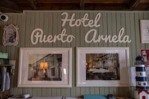 Ein Zertifikat, Auszeichnung, Logo oder anderes Dokument, das in der Unterkunft Hotel Puerto Arnela ausgestellt ist