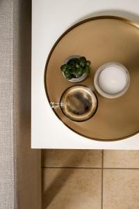a bowl with a spoon and a bowl of food at Rokani Studio I at Kalavrita Center in Kalavrita