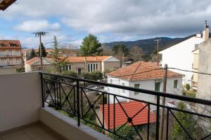 a balcony with a view of a city at Rokani Studio II at Kalavrita Center in Kalavrita