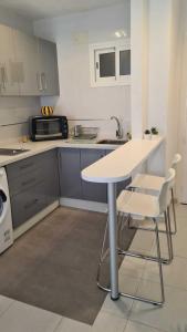 Kuchyňa alebo kuchynka v ubytovaní Benalmadena Jupiter - Lovely 1Bedroom Apartment