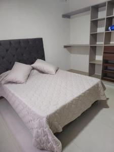 Ένα ή περισσότερα κρεβάτια σε δωμάτιο στο Casa entera familiar AMY, cómoda y acogedora +6 φωτογραφίες