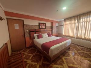 Postel nebo postele na pokoji v ubytování Hotel Manantial