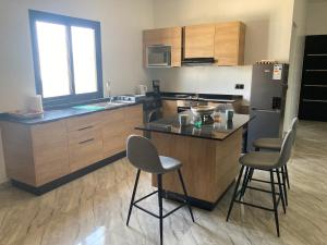 Kuchyň nebo kuchyňský kout v ubytování Appartement de standing