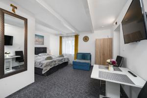 TV a/nebo společenská místnost v ubytování Apartments Stars