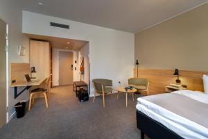 Katil atau katil-katil dalam bilik di Radisson Hotel Papirfabrikken Silkeborg