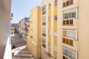 a view from the balcony of an apartment building at Wintowinrentals Urban Rincón - Cozy & Central next to Beach in Rincón de la Victoria