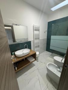 Koupelna v ubytování B&B Ancora del Sud + 37 fotografií