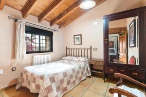 Ένα ή περισσότερα κρεβάτια σε δωμάτιο στο La Carrasca - Limón +24 φωτογραφίες