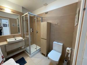 Koupelna v ubytování Villa René Beach