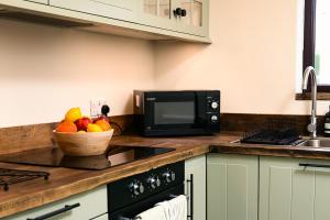 Kuchyň nebo kuchyňský kout v ubytování Hickory Cottage + 6 fotografií