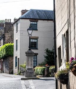 a street light in front of a house at Wirksworth Townhouse - full of character in Wirksworth