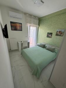 Postel nebo postele na pokoji v ubytování B&B Ancora del Sud