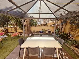 Zahrada ubytování Appartement F4 avec jardin à deux pas de la mer