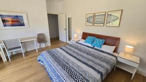 Postel nebo postele na pokoji v ubytování LAGA SURFING IBARRANGELU