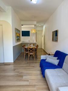 Un lugar para sentarse en Apartamento Ubatuba - Host Home