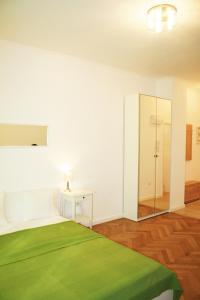 Postel nebo postele na pokoji v ubytování Apartment Lea