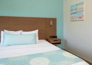 Letto o letti in una camera di Brisa Pacific Hotel Encinitas
