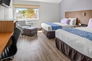 Letto o letti in una camera di Brisa Pacific Hotel Encinitas