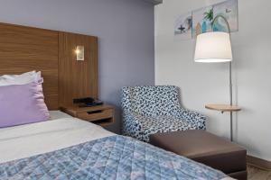 Letto o letti in una camera di Brisa Pacific Hotel Encinitas