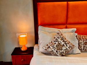 Letto o letti in una camera di Naina Spring Resort, Manali - away from city hustle