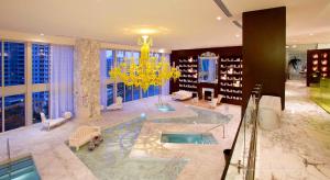a large bathroom with a tub with a chandelier at Luxury Miami Condo with Breathtaking City & Bay Views in Miami