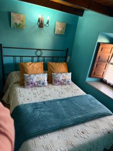 Postel nebo postele na pokoji v ubytování Vivienda Vacacional El Navariegu 1