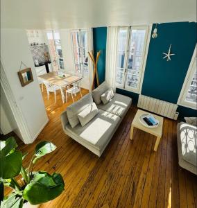 Posezení v ubytování Le Duplex, parking & Accès Plage !