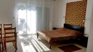 Кровать или кровати в номере Affabilis VIP House