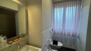 Kúpeľňa v ubytovaní Tropicana Room