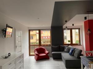 Χώρος καθιστικού στο Apartamenty Kolorowe Ustka