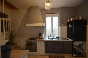 Η κουζίνα ή μικρή κουζίνα στο APPARTEMENT Zen +7 φωτογραφίες